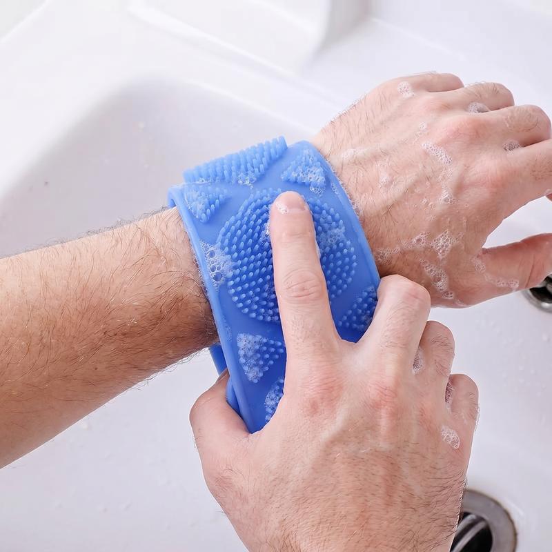 Blue silicone scrubber belt used to wash an arm